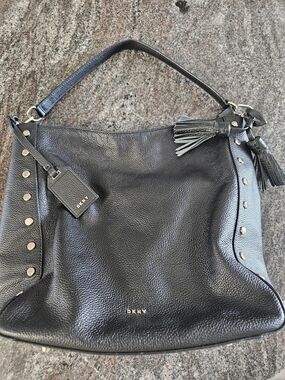 DKNY Black Leather Hobo Bag with Tassel and Stud Accents